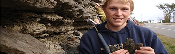 Student doing fieldwork in a lab